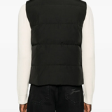 Black jacket worn by a person, showing the jacket fit
