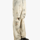 Grey pants worn by a person, showing the pants fit