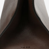 Close up of brown bags, showing texture of the fabric