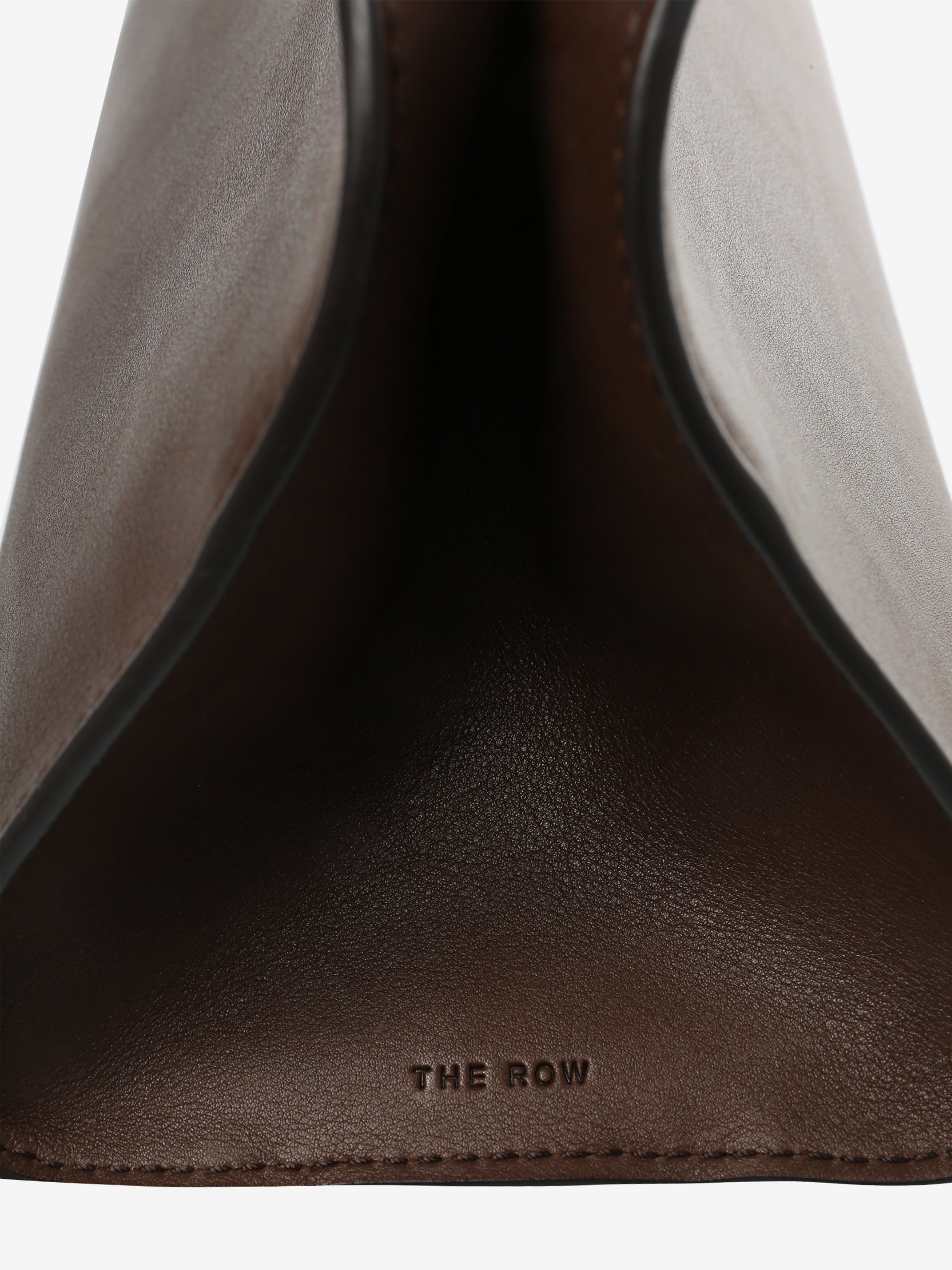 Close up of brown bags, showing texture of the fabric