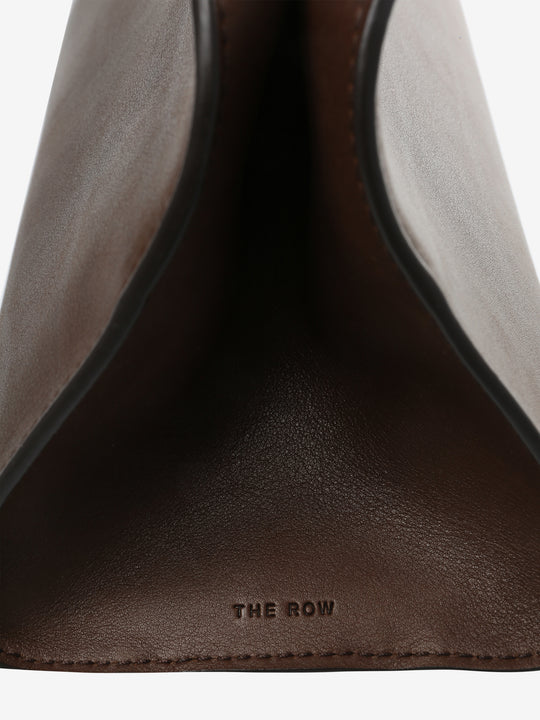 Close up of brown bags, showing texture of the fabric