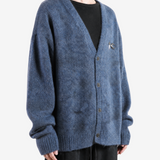 Blue hoodie worn by a person, showing the hoodie fit