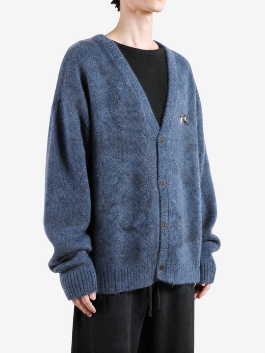 Blue hoodie worn by a person, showing the hoodie fit