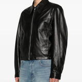 Black leather jacket worn by a person, showing the jacket fit