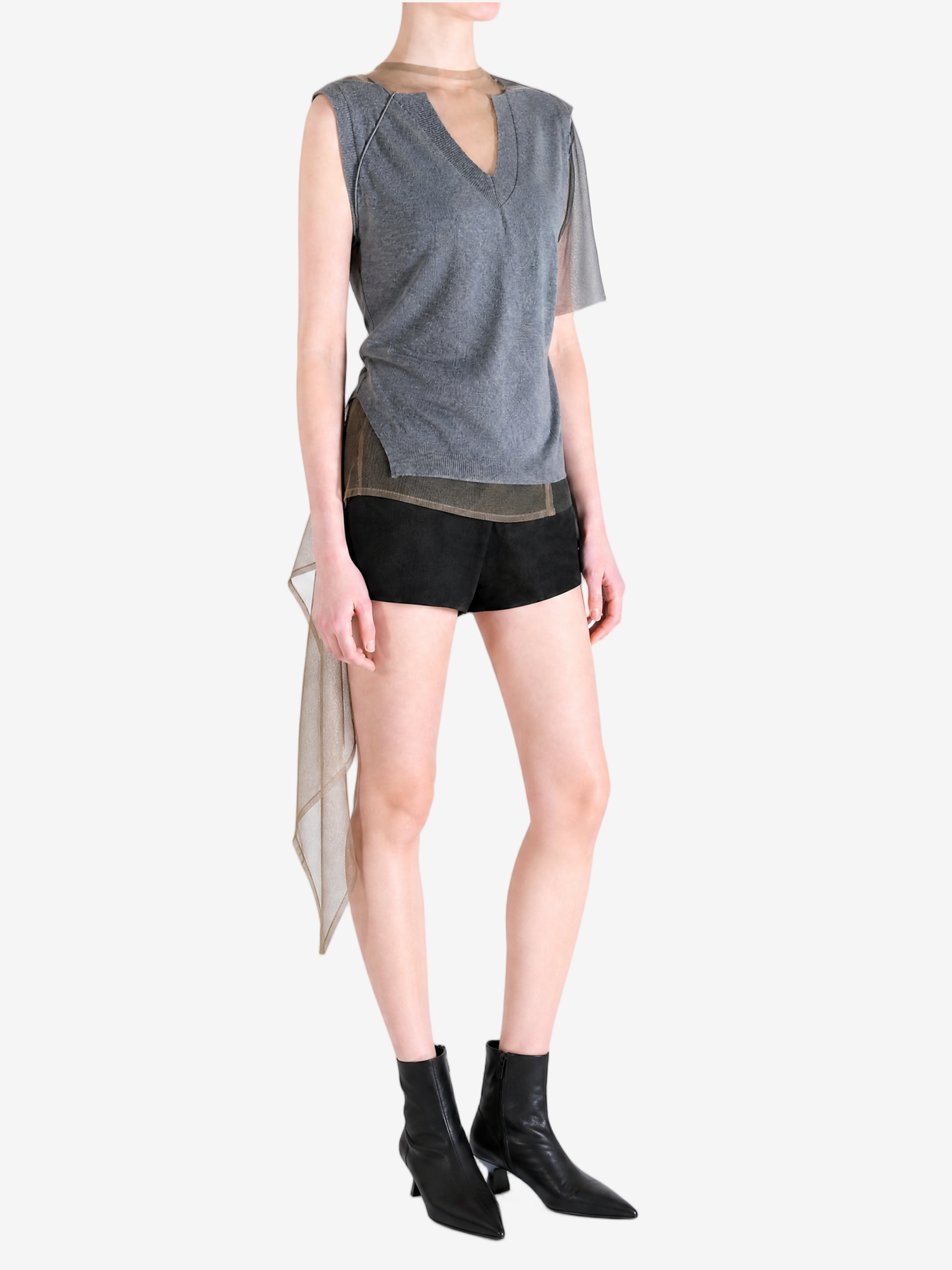 grey shirt worn by a person, showing the shirt fit