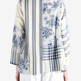Blue top worn by a person, showing the top fit