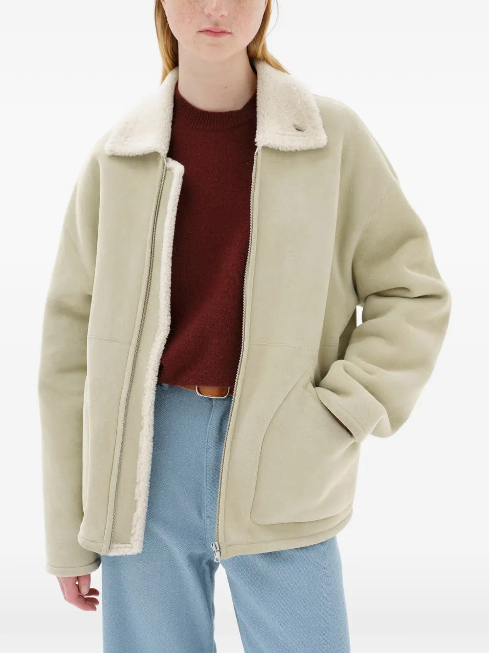 Tan jacket worn by a person, showing the jacket fit