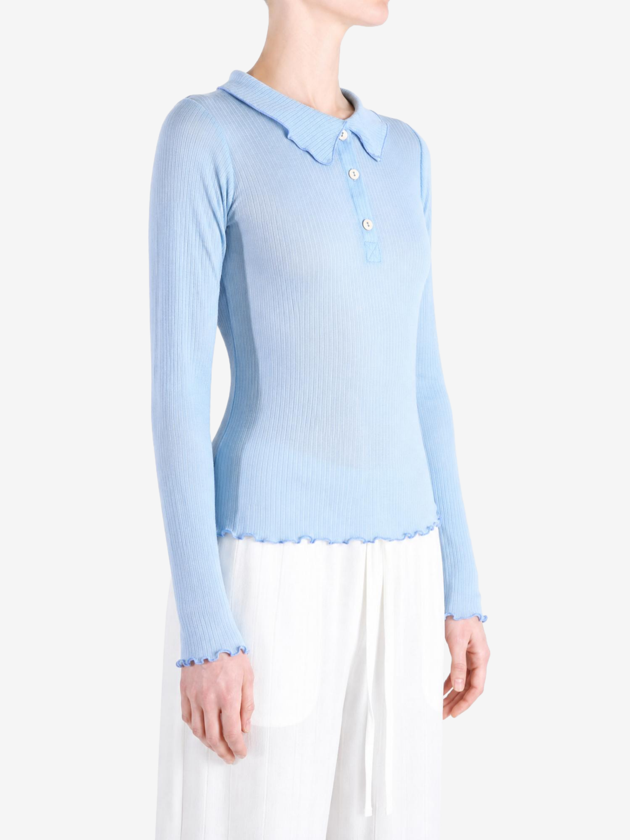 Blue shirt worn by a person, showing the shirt fit