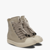 Tan sneakers, side view