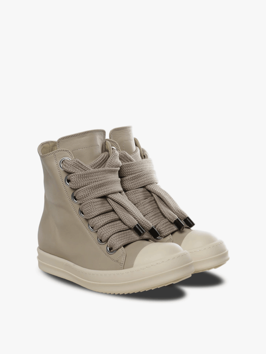 Tan sneakers, side view