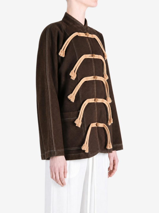 Brown jacket worn by a person, showing the jacket fit