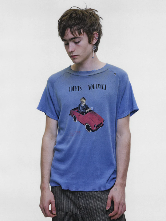 Blue t-shirt worn by a person, showing the t-shirt fit