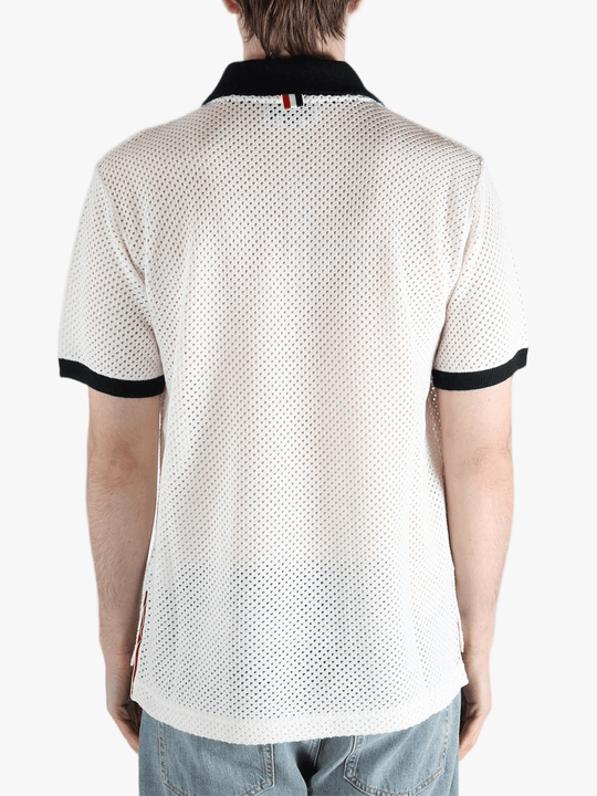 White shirt worn by a person, showing the shirt fit