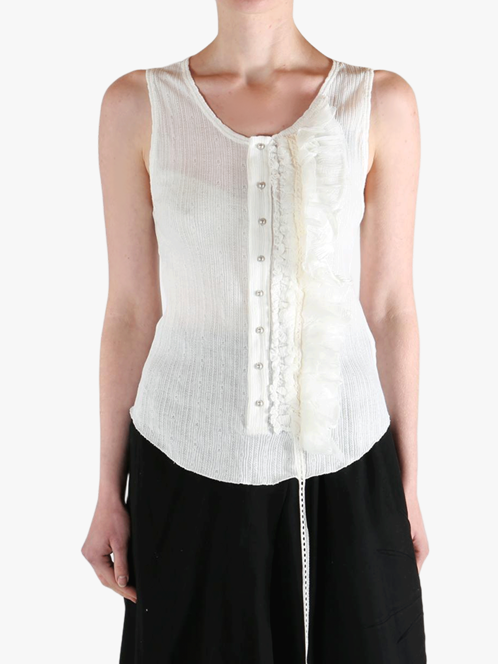 White top worn by a person, showing the top's fit