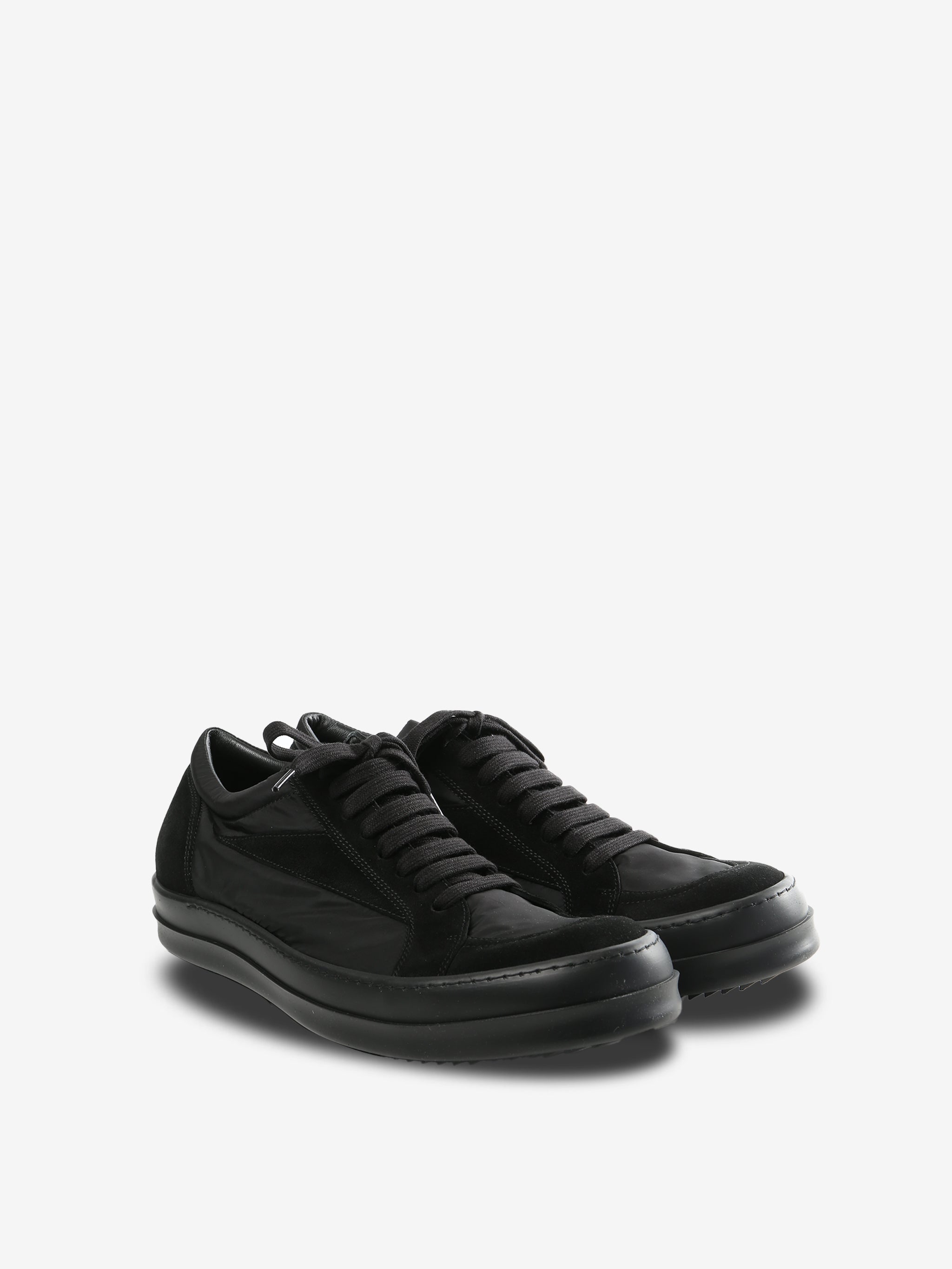 black sneakers, side view