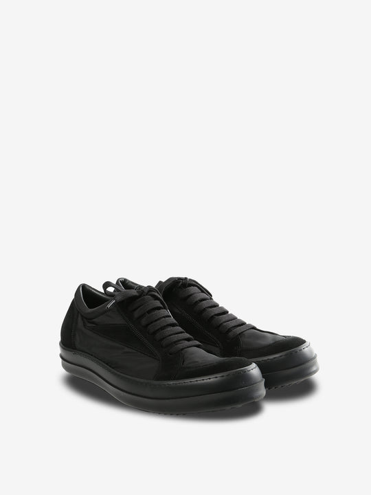 black sneakers, side view