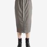 Grey skirt worn by a person, showing the skirt's fit