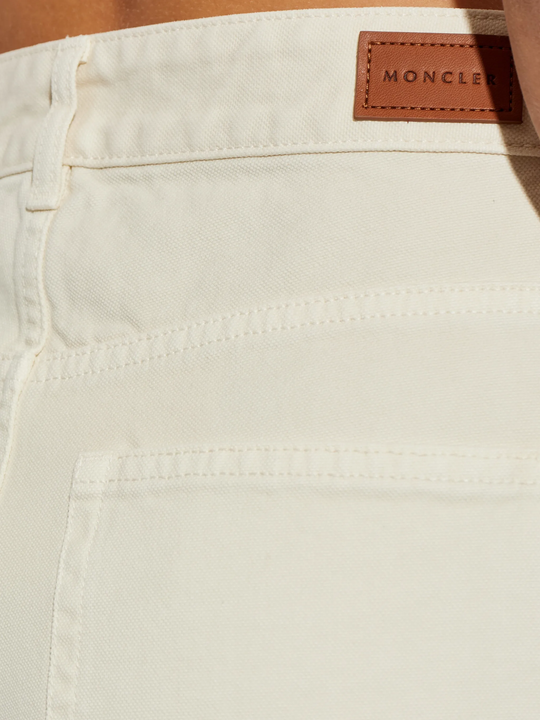 Close up of tan pants, showing texture of the Cotton fabric