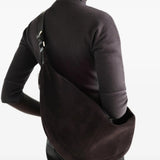 Brown bag worn by a person, showing the bag fit