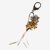 Yellow brooch, side view