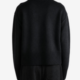 Black knitwear, full body view