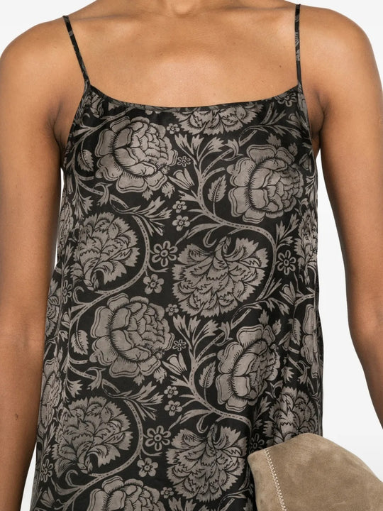 Close up of black dresses, showing texture of the viscose and cupro fabric