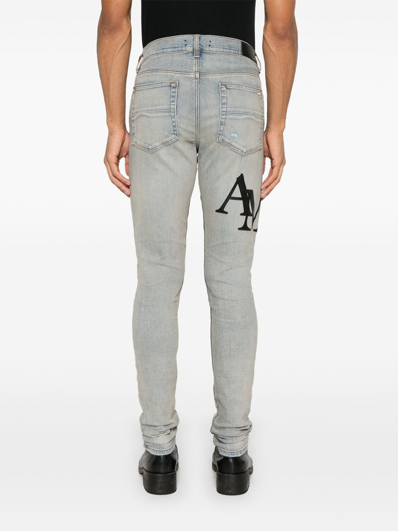 AMIRI - Men Staggered Logo Skinny Jean