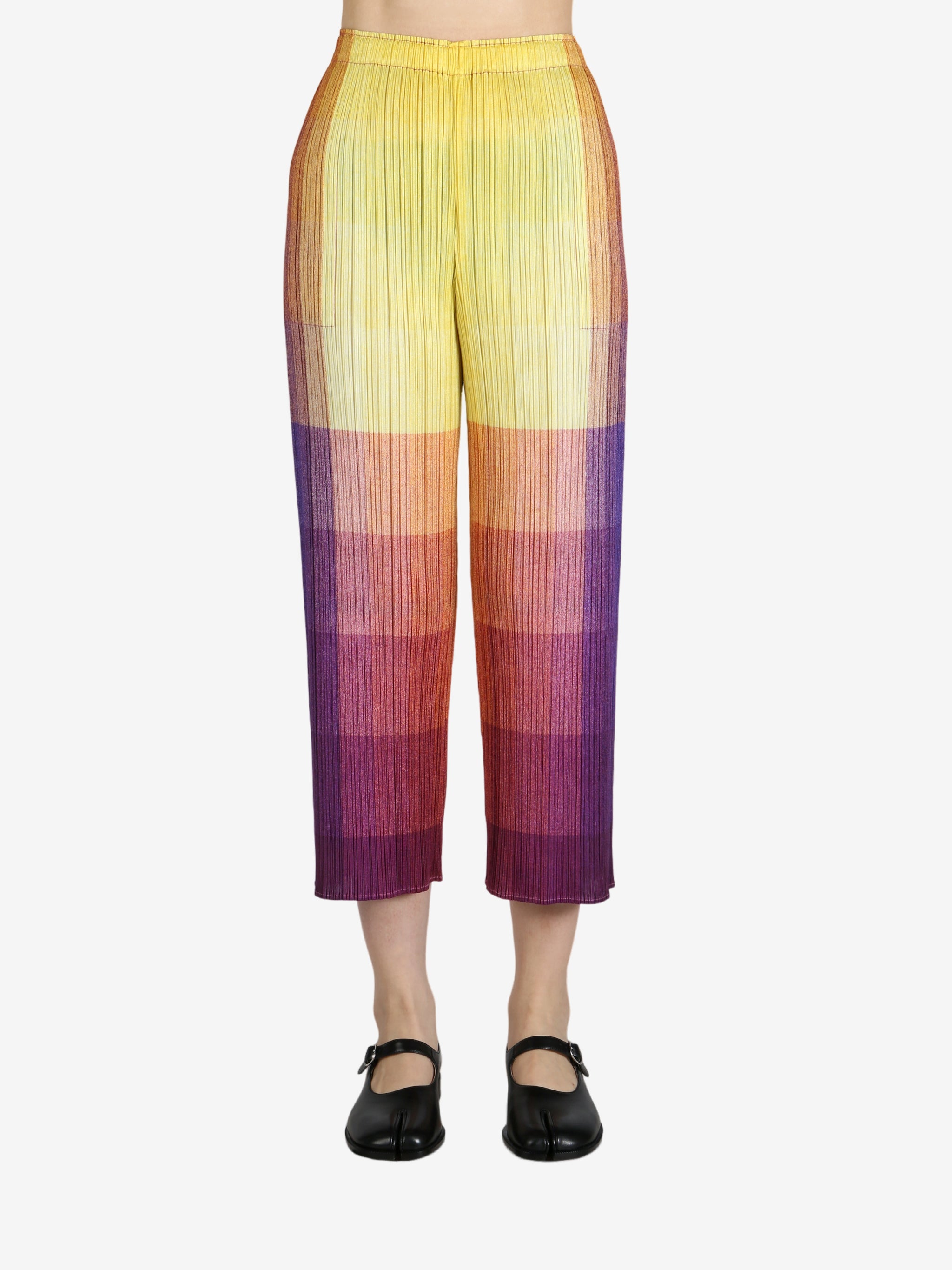 Colorful pants worn by a person, showing the pants's fit