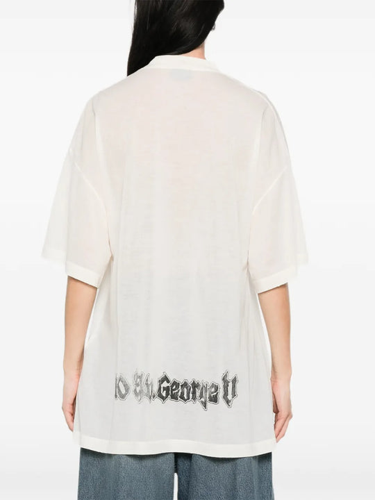 White t-shirt worn by a person, showing the t-shirt's fit