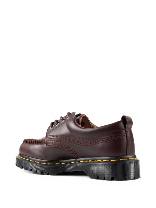 Burgundy shoes, side view