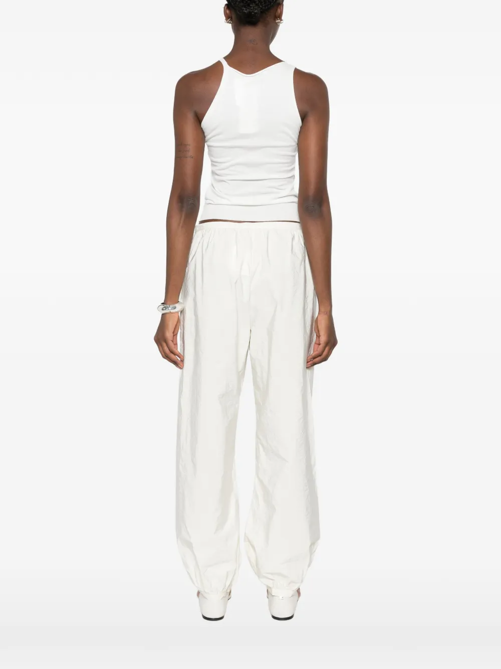 White top, full body view