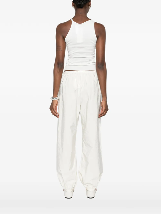 White top, full body view