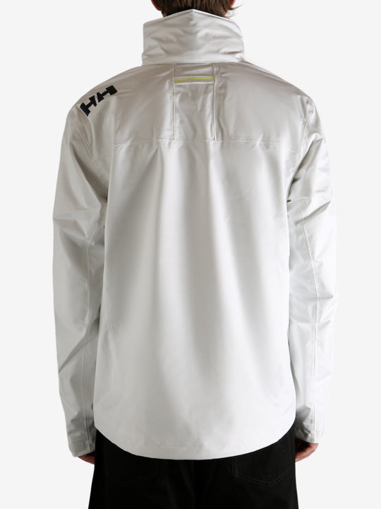 white jacket worn by a person, showing the jacket fit