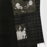 Close up of black shirts, showing texture of the wool fabric