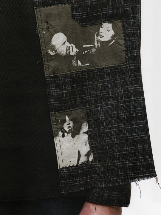 Close up of black shirts, showing texture of the wool fabric