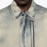 Close up of grey jacket,showing texture of the cotton fabric.