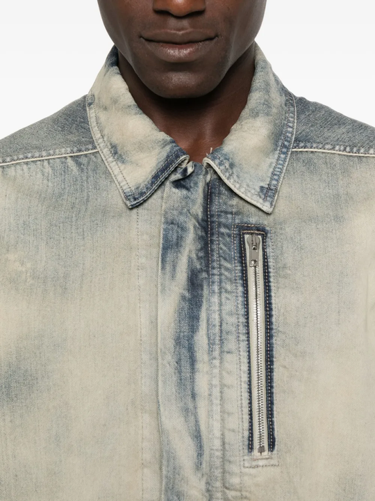 Close up of grey jacket,showing texture of the cotton fabric.