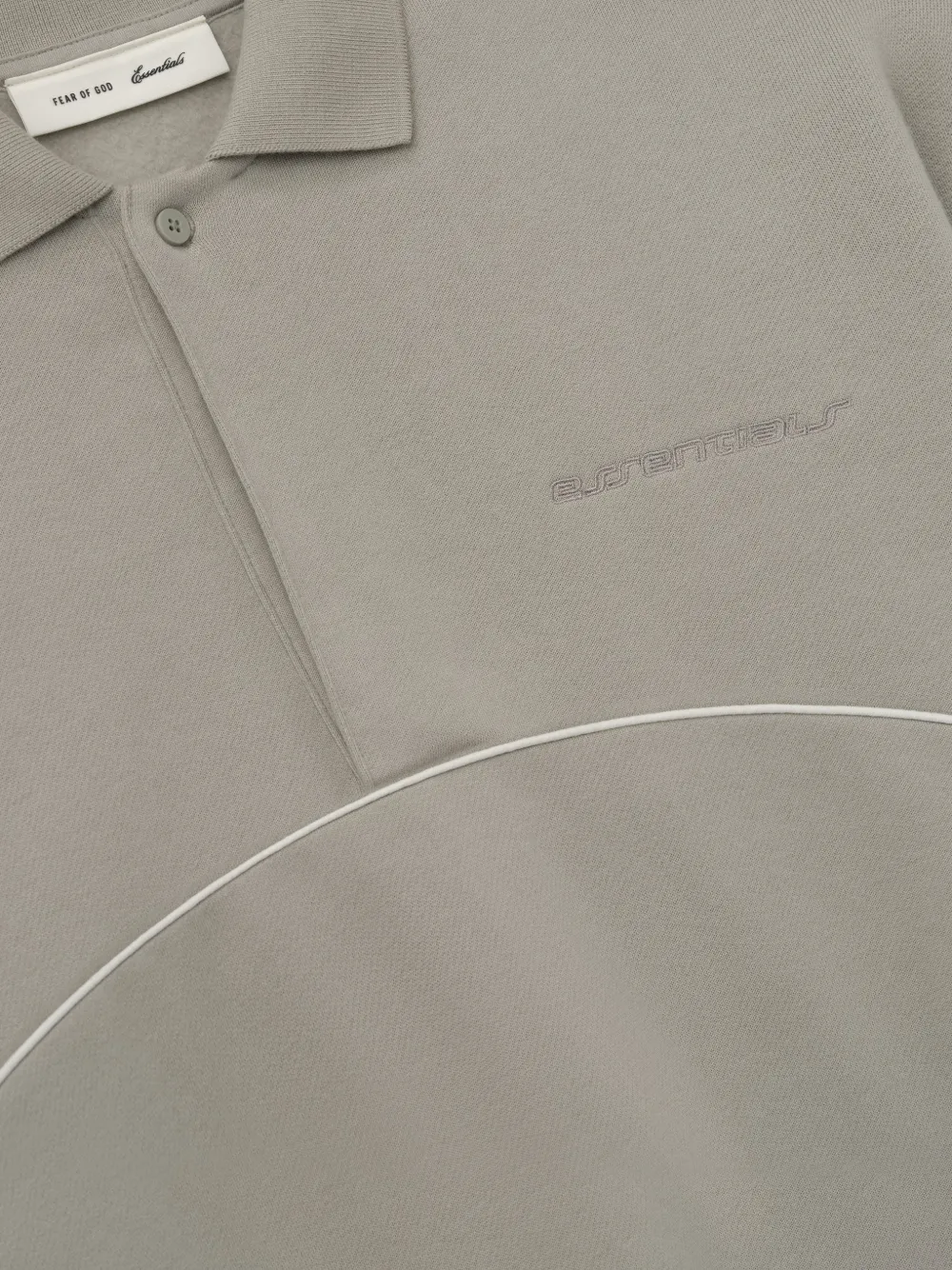 Close up of grey shirt, showing texture of the Cotton and Polyester fabric