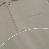 Close up of grey shirt, showing texture of the Cotton and Polyester fabric