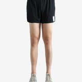 Black shorts worn by a person, showing the shorts' fit