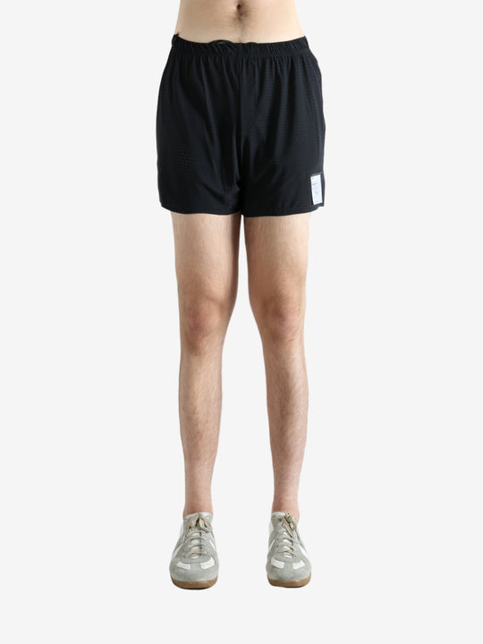 Black shorts worn by a person, showing the shorts' fit