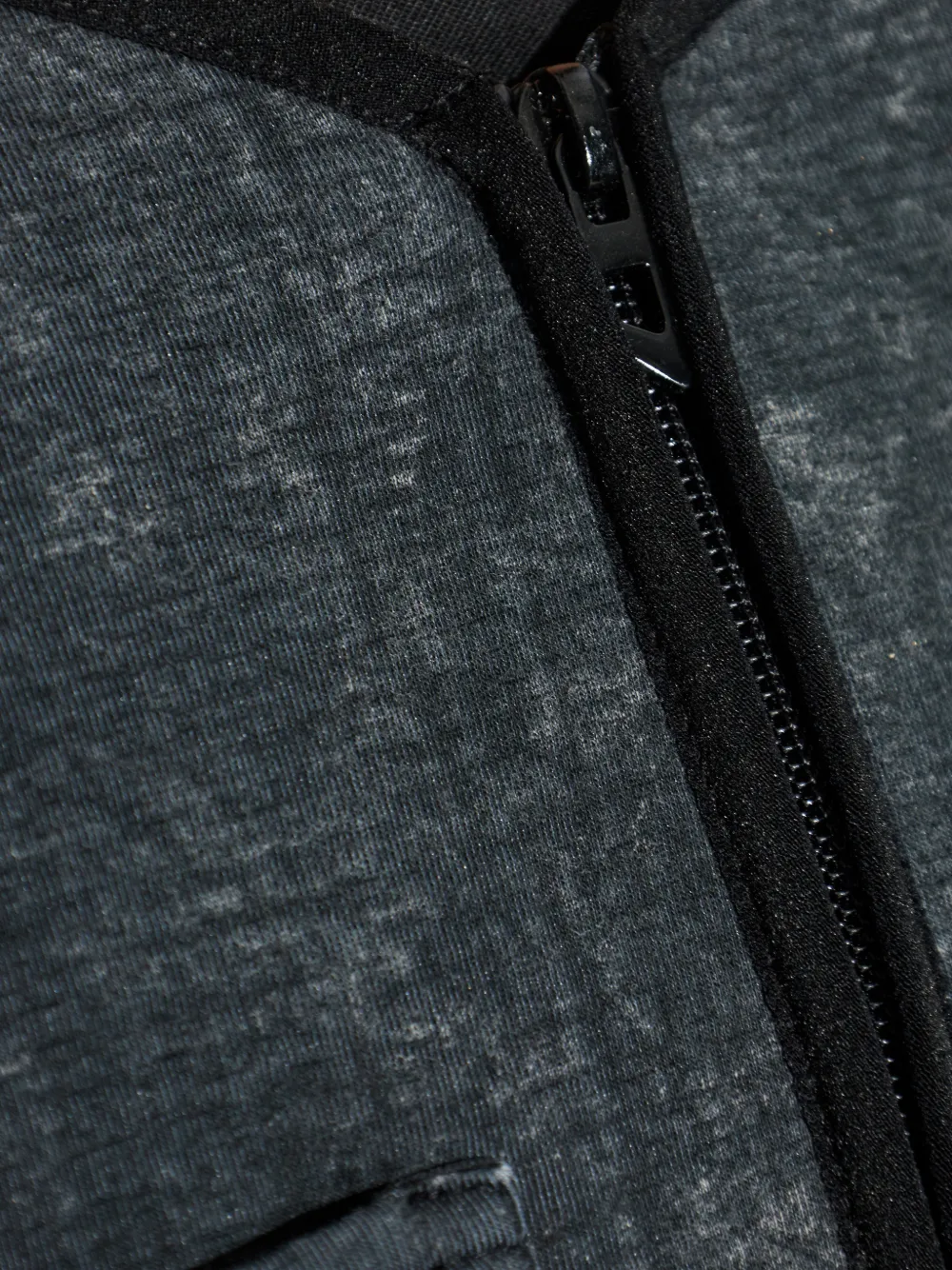 Close up of grey jacket, showing texture of the Cotton fabric