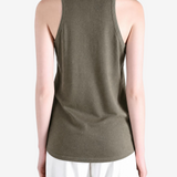 Brown top worn by a person, showing the top fit