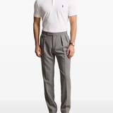 White tee worn by a person, showing the tee's fit