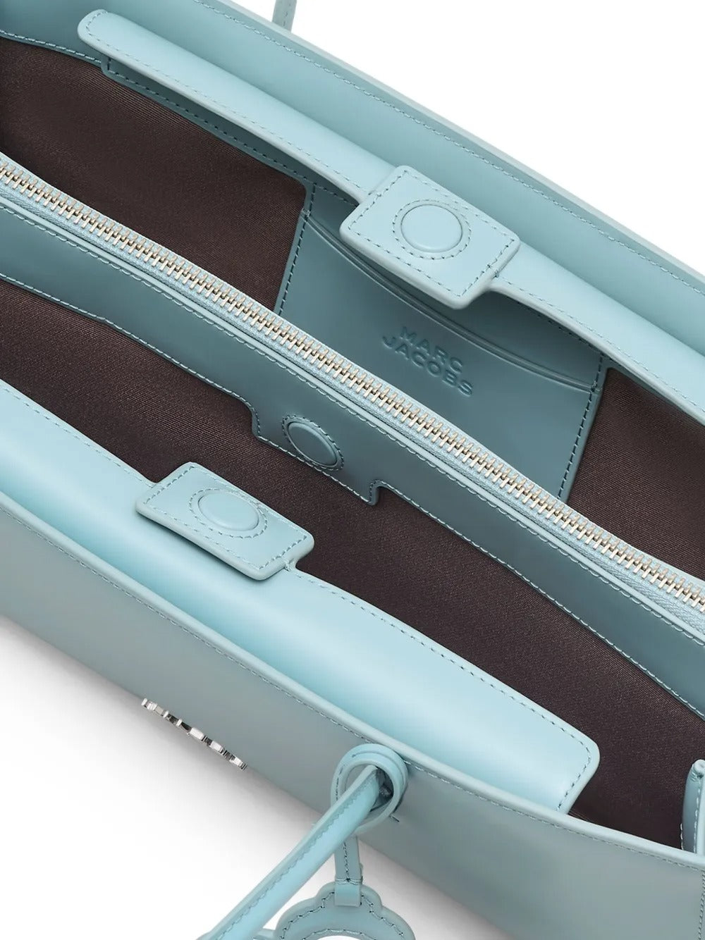 Close up of the blue bag, showing texture of the leather fabric