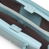 Close up of the blue bag, showing texture of the leather fabric