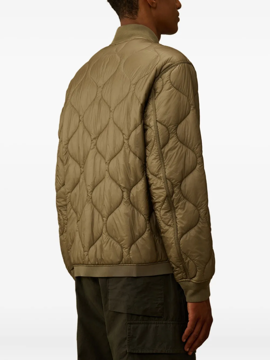 Close up of brown top,showing texture of the cotton fabric.