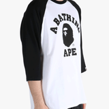 White t-shirt worn by a person, showing the t-shirt's fit