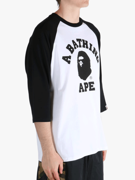 White t-shirt worn by a person, showing the t-shirt's fit