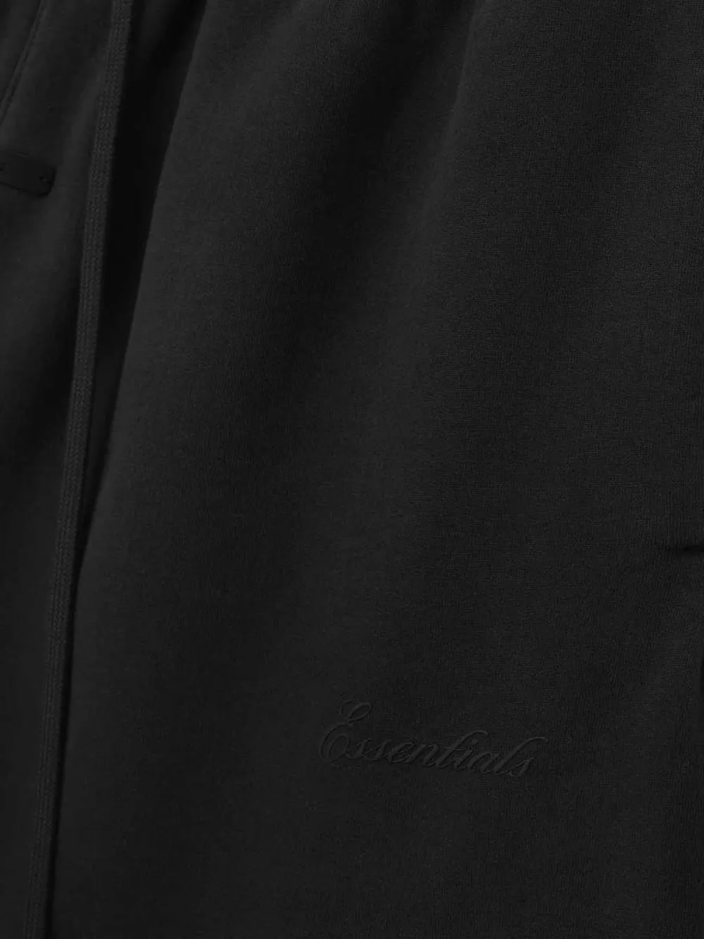 Close up of Black pants, showing texture of the cotton fabric